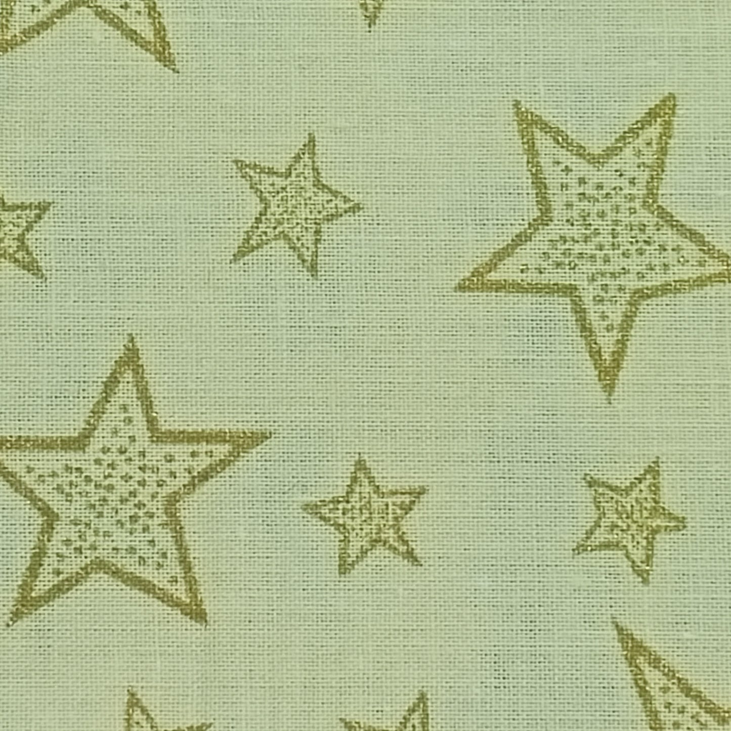 Tejido navideño estrellas doradas sobre fondo beige